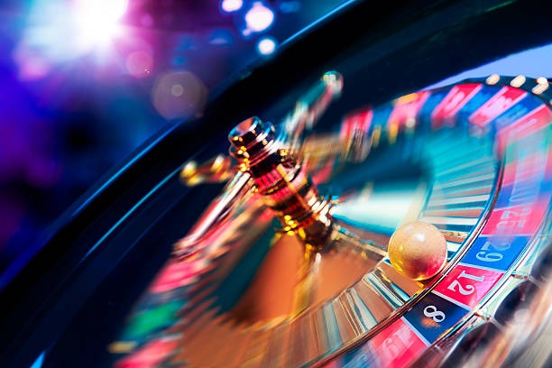 Sic Bo live dealer table with three dice and betting layout visible on camera feed